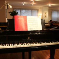 A Mozart piano music score sits on Bright Sheng's grand piano.