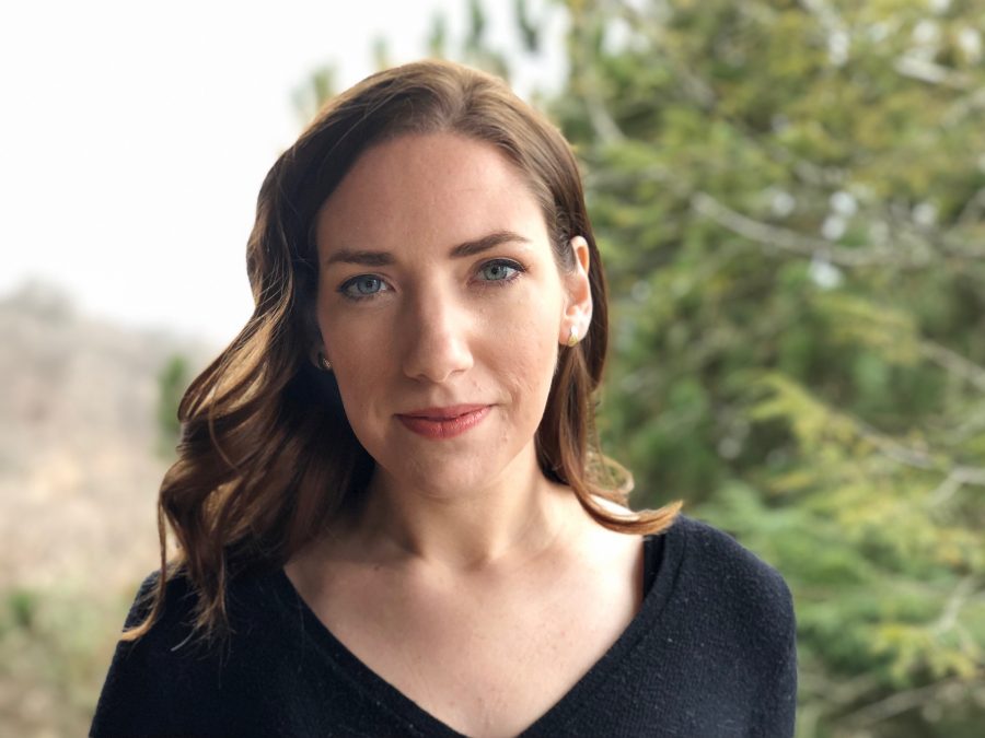 Dale Trumbore standing outside near a tree