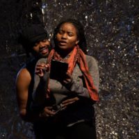 Two performers on stage