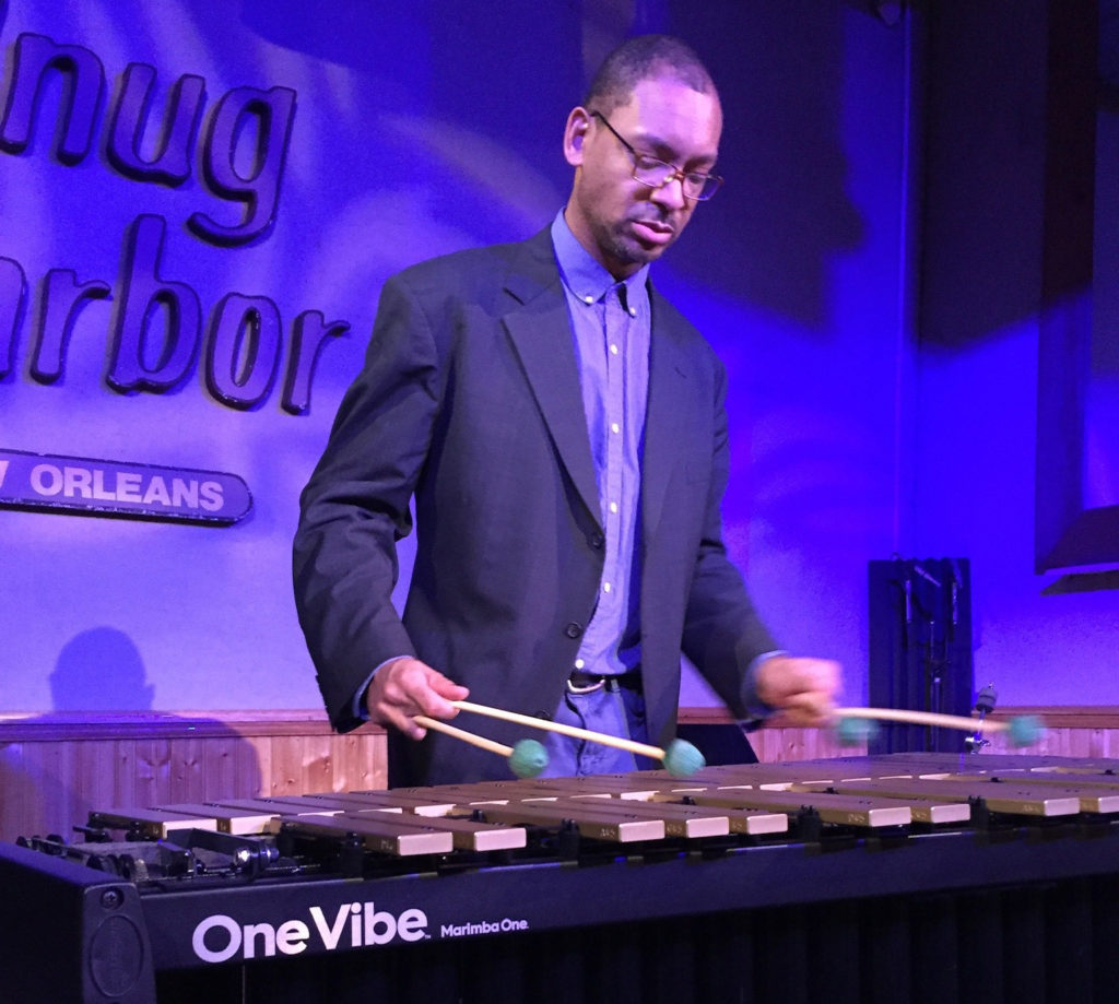Jason Marsalis playing the vibraphone at a performance.