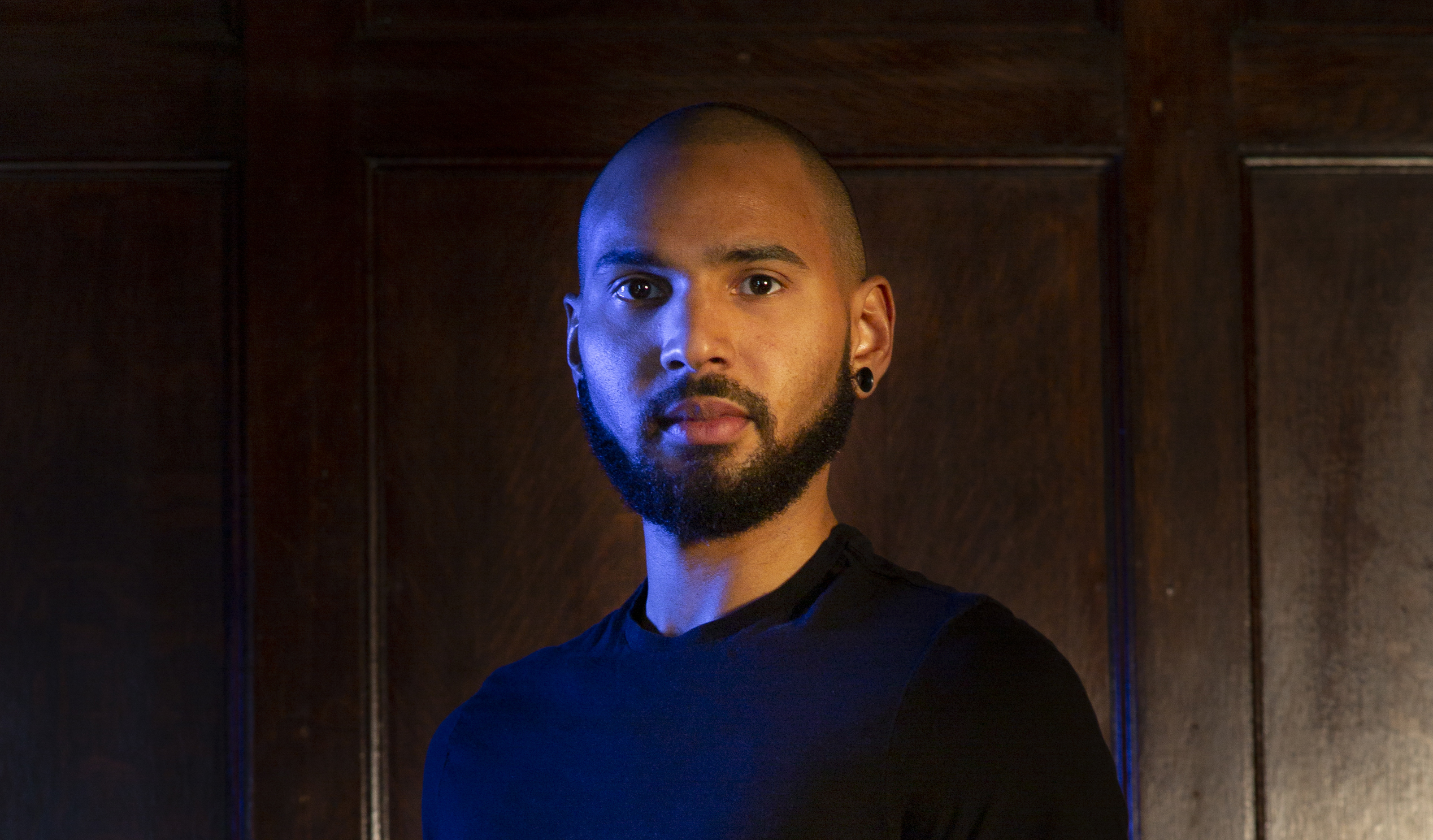 Keith Rodger standing near a door